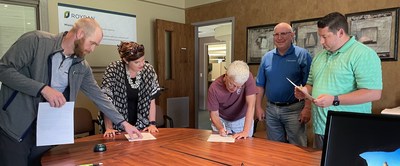 ROYDAN leadership team officially signing the documents to transition the company to being employee owned.  From Left to Right:  Jason Gillman, Megan Manis, Anne Schutte, Dan Hornung, and Ryan Manis.