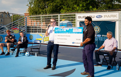 Alan Bethke of Subaru of America presents donation check for $10,000 to the YMCA of Greater Philadelphia to support Soccer for Success. Pictured Left to Right: Jim Curtin, Head Coach of Philadelphia Union, Charlie Slonaker, Chief Revenue Officer of Philadelphia Union, Alan Bethke, Sr. VP of Marketing of Subaru of America, Justin Spencer-Linzie, Executive Leader of Greater Philadelphia YMCA, and Victor Carstarphen, Mayor, City of Camden.
