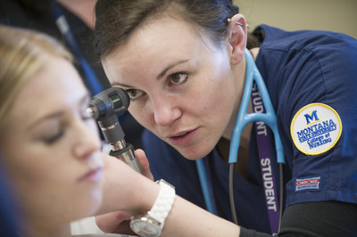A Montana State University nursing student conducts an examination as part of her clinical training. The MSU College of Nursing has received a $101 million gift from Mark and Robyn Jones, founders of Goosehead Insurance, to expand nursing education in Montana and help fill the critical shortage of nurses to serve rural and remote areas in Montana and beyond. The Jones' gift is the largest to a school of nursing in U.S. history. Montana State University photo by Kelly Gorham