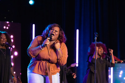 GRAMMY winner Tasha Cobbs Leonard sets the stage at McDonald's Inspiration Celebration Tour, leading the audience in praise and worship.