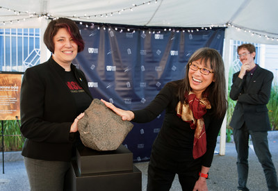 Dr. R. Aileen Yingst, Senior Scientist at the Planetary Science Institute, and Florence Tan, Chair of the Small Spacecraft Coordination Group at NASA Headquarters, with Taoudenni 002. Photo courtesy of MMGM.