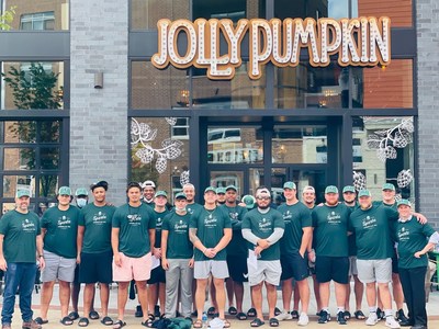 Members of the Jolly Pumpkin management team with the Offensive Linemen and Long Snappers