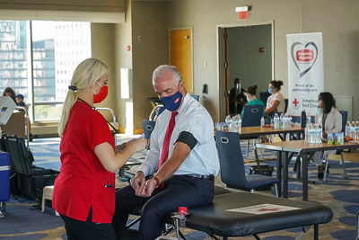 Suburban Propane President & CEO, Michael Stivala prepares to donate blood during the Seventh Annual Jersey City Police & Fire 9/11 Memorial Blood Drive.