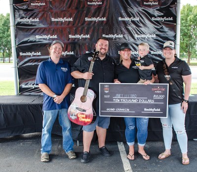Janky Leg BBQ is presented with $10,000 for securing the overall title at the inaugural Smithfield Classic in Nashville, Tenn.