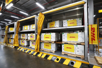 Preparing COVID-19 vaccines for delivery at a DHL facility (PRNewsfoto/DHL Express)