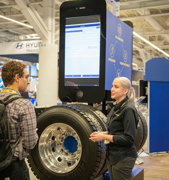Jamie Redmond, Goodyear’s customer engagement specialist, demonstrates Tire Optix, Goodyear’s digital inspection toolset, enables fleets to capture tire data accurately and efficiently with instant results. The solution provides an easy-to-use, handheld digital tire inspection toolset and helps fleets save time and labor hours on tire reading and preventative maintenance. (Jessica Yanesh for Goodyear)