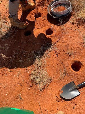 FIGURE 1: PHOTOS FROM SITE VISIT TO ARTIC FOX & ISBJORN PROJECTS - Note: Auger holes and sampling on the auger traverse at Isbjorn Project (Source: Megawatt geology team) (CNW Group/MegaWatt Lithium and Battery Metals Corp.)