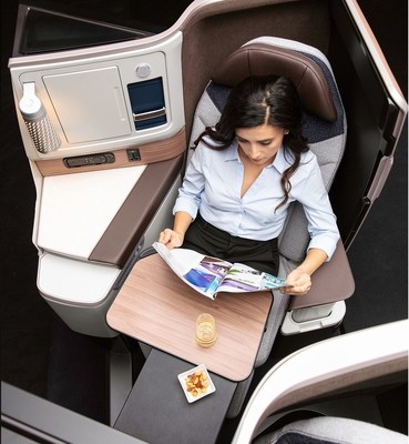 Adient Ascent business-class seat with Satterfield table.