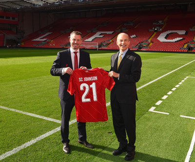 Anfield Stadium, Liverpool, 16 September 2021: [Pictured R-L] To mark the launch of the new global sustainability partnership, Goals for Change, Fisk Johnson, Chairman and CEO, SC Johnson is presented with a branded LFC shirt by Billy Hogan, CEO Liverpool Football Club. The partnership will feature a series of initiatives to drive improvements in sustainability, health and hygiene and provide pathways to greater economic and social mobility for underserved youth across Liverpool FC’s communities in the UK, Asia and Latin America.