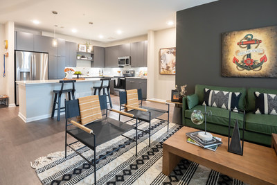 An apartment at Bellevue at Avondale featuring an open floor plan and chef inspired kitchen with an oversized island