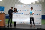 Andre De Grasse presents cheque to Kids Help Phone from RACE WITH ME! Virtual Challenge