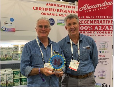 With the Nexty Award for Best New Mission- Based Product, Alexandre Family Farm COO Robert Brewer and western regional sales manager Gary Olson at Natural Products Expo East in Philadelphia today.