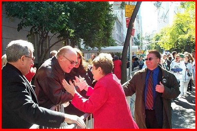Portland, Oregon Mayor Vera Katz hugs a New Yorker at the 2001 Columbus Day Parade.
