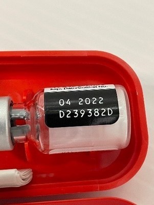 APPENDIX A: The Lot Number is found on the kit and vial labels as can be seen in the example label above.