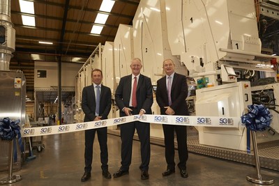 Global lottery company Scientific Games celebrates a multi-million dollar expansion at its Leeds, UK instant game production facility with (L to R): Mark Scholey, Scientific Games VP Global Manufacturing; Hilary Benn, Member of Parliament for Leeds Central; Kevin Anderson, Scientific Games VP Global Strategic Accounts EMEA.