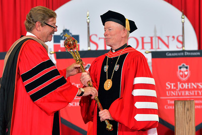 Rev. Brian J. Shanley, O.P. is formally installed as the 18th President of St. John's University (NY) and accepts the University Mace from William J. Janetschek ’84CBA, ’17HON, Chair of the University’s Board of Trustees.