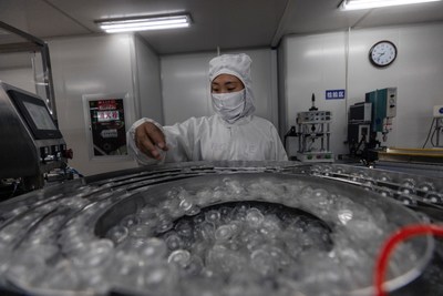 A woman works in a Suyun factory for medical supplies.