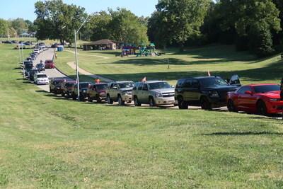 100 cars and motorbikes rode through the city to promote peace.