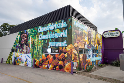 The Austin mural, by J Muzacz, celebrates three female farmers and cooperative leaders, located at the Guadalupe Wheatsville Co-op in Austin. The featured include Sarah Larweh, Eugenie Lago and Assata Doumbia, who grow cocoa used in Fairtrade certified goods.  This mural is one of three commissioned by Fairtrade America for its second annual 'Choose Fairtrade: Choose the world you want.' campaign and celebrates how choosing Fairtrade helps fight poverty. -Photo credit Melanie Grizzel