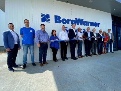 BorgWarner executives and plant leaders cut the ribbon for the Grand Reopening and 25th Year Celebration of the BorgWarner Seneca plant.
