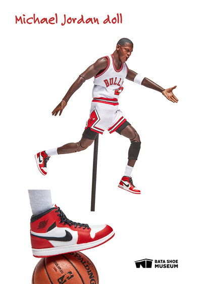 Michael Jordan doll and miniature sneakers on display in “All Dolled Up: Fashioning Cultural Expectations”. Image © 2021 Bata Shoe Museum, Toronto, Canada (photo: Kailee Mandel). (CNW Group/Bata Shoe Museum)