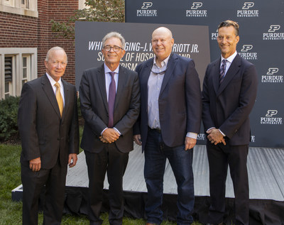 Together for the announcement of the White Lodging – J.W. Marriott, Jr. School of Hospitality and Tourism Management were Purdue President Mitch Daniels, Bruce White, Founder and CEO of White Lodging; Liam Brown, Group President, U.S. and Canada of Marriott International; and Michael Berghoff, Chair of the Purdue Board of Trustees. (PRNewsfoto/White Lodging)