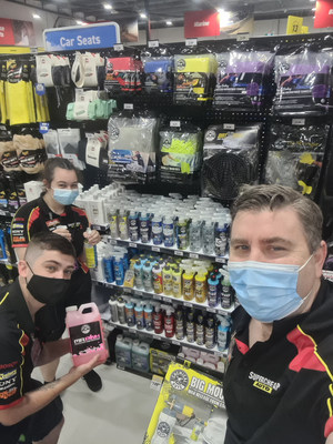 Supercheap Auto employees show off new Chemical Guys products on retail shelves September 30, 2021.