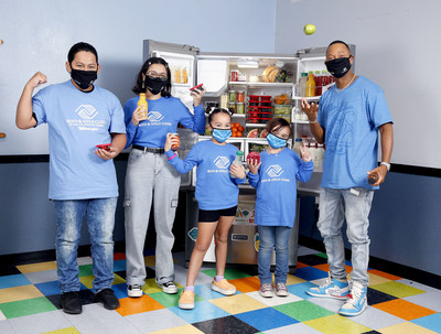 Actor and advocate Terrence Jenkins celebrates the launch of Maytag brand's Feel Good Fridge program with Boys and Girls Club kids at Wilmington, Los Angeles.