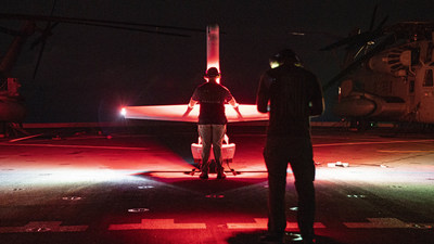 Operators supporting the 11th Marine Expeditionary Unit prepare to launch a V-BAT UAS aboard amphibious USS Portland (LPD 27). Photo by Sgt. Alexis Flores, USMC.