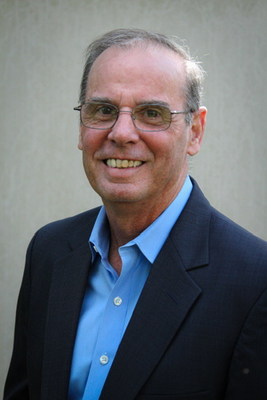 Mark E. Robbins as Executive Director