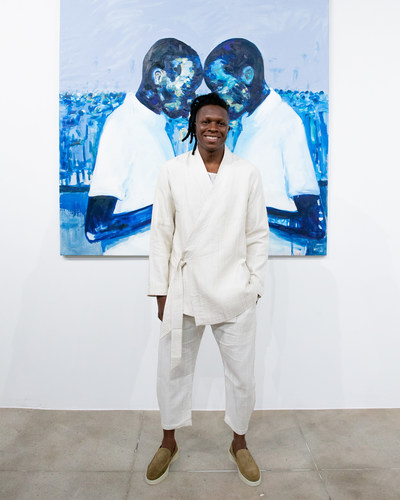 Nelson Makamo poses at his BLUE exhibition