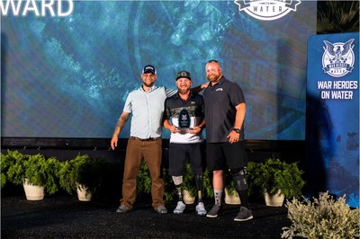 The Tournament's three Ron Ashimine Award winners share the WHOW awards stage. The award is bestowed upon the tournament's top angler, which is determined based on total points. From left, Drew Mewes (2020), Larry Draughn (2021) and Kaleb Weakley (2019).