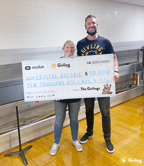 Crystal Valerie, $10K check recipient, and Seth Beard of Givling, Inc.