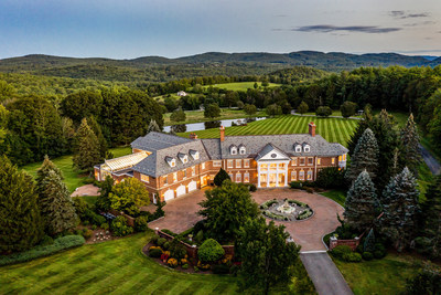 The tri-level residence’s stately brick exterior and circular motor court with central fountain create a grand sense of arrival. Custom-built in the early 1990’s by its original (and only) owner, the property has enjoyed substantial improvements in recent years, including a new slate roof in 2020. More at NewHampshireLuxuryAuction.com.