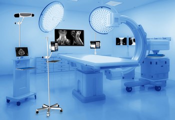 A layout of a general operating room and Explorer Live’s integration with imaging devices, navigation systems, and minimal footprint in an operating room. Explorer Surgical