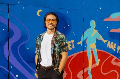 Artist Kent Yoshimura pictured in front of the mural at 6 Rose Avenue in Los Angeles' Venice neighborhood.