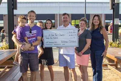 The ProActive Solutions Team presented a check for $2500 to A Cure for Charlie.