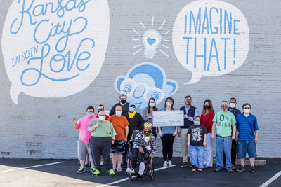 The ProActive Solutions Team presented a check for $2500 to Imagine That KC.