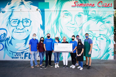 Members of Hyundai’s Employee Resource Group, Amigos Unidos, with family and friends volunteering and presenting a donation to Teri Hatleberg from Someone Cares Soup Kitchen in Costa Mesa, Calif., Sunday, Oct. 10, 2021