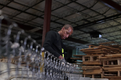 At Park City Green in Bridgeport, Conn., mattresses are dismantled manually by cutting open the mattress and separating the layers of materials for use in secondary markets.