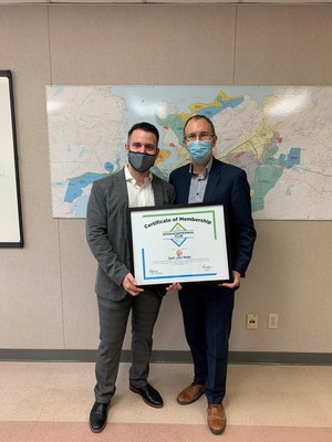 Pictured: DIPRA Regional Engineer Sam Ghosn (left) presenting the city of Saint John's Sesquicentennial Club Membership Plaque to Brent McGovern, P.Eng - Commissioner, Utilities & Infrastructure at the City of Saint John, NB.