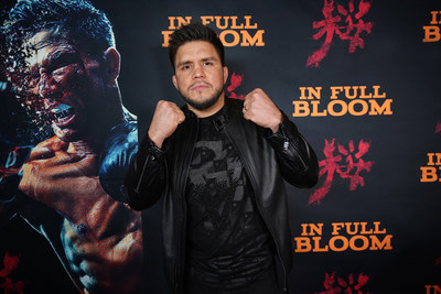 Henry Cejudo at the IN FULL BLOOM premiere by Andre Jaramilo. At age 21 Cejudo became the youngest American Gold Medalist at the 2008 Beijing Olympics when he defeated Tomohiro Matsunaga of Japan to win the 121-Proud Freestyle wrestling final. He then went on to become the UFC Champion in two weight divisions making him one of the greatest combat sports athletes of all time.