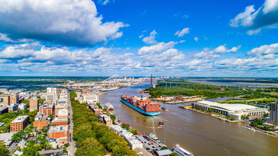 Savannah Georgia and River Downtown Skyline Aerial. The bustling port of Savannah is one of the nations fastest growing ports over the past 10 years.