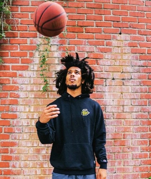 Tyger Campbell, here wearing the classic Honeybee Hoodie, is keeping his eye on the ball this season.