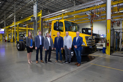 Representatives from Cummins, Penske Truck Leasing and Hino Trucks Commemorate the delivery of the first Cummins powered truck to Penske Truck Leasing at the Hino plant in West Virginia.