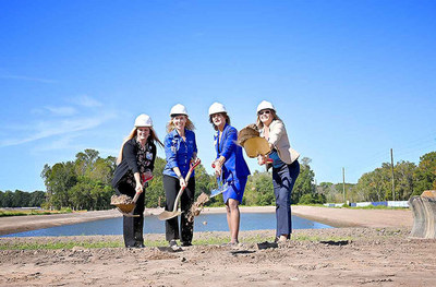Hospital leaders take their turn breaking ground at the ceremonial event on Oct. 18.