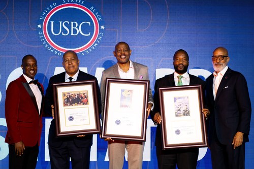 Sherman Wright (center) receiving 2021 Small Business of the Year by US Black Chambers