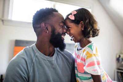 father and daughter laughing in bedroom - stock photo
Credit: MoMo Productions/Getty Images