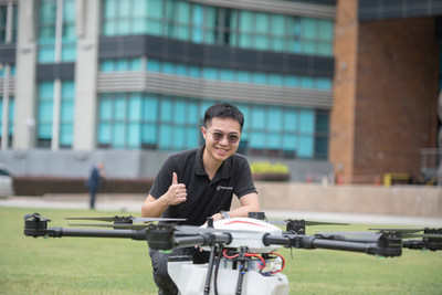 Poladrone's Founder and CEO, Jin Xi Cheong (JX) with Oryctes Drone - the world’s first precision spot spraying drone for oil palms