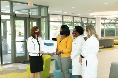 AANP President Dr. April N. Kapu Presents AANP Certificate of Recognition to the USC College of Nursing. Pictured:  Dr. April N. Kapu, USC College of Nursing Faculty: Dr. Eboni Harris, Dr. Karen Worthy, Dr. Kate Chappell. Photo Credit: “Andrew Lee/720 Strategies”